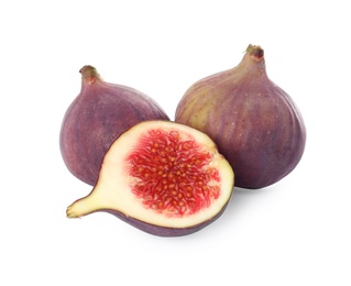 Photo of Whole and cut tasty fresh figs isolated on white