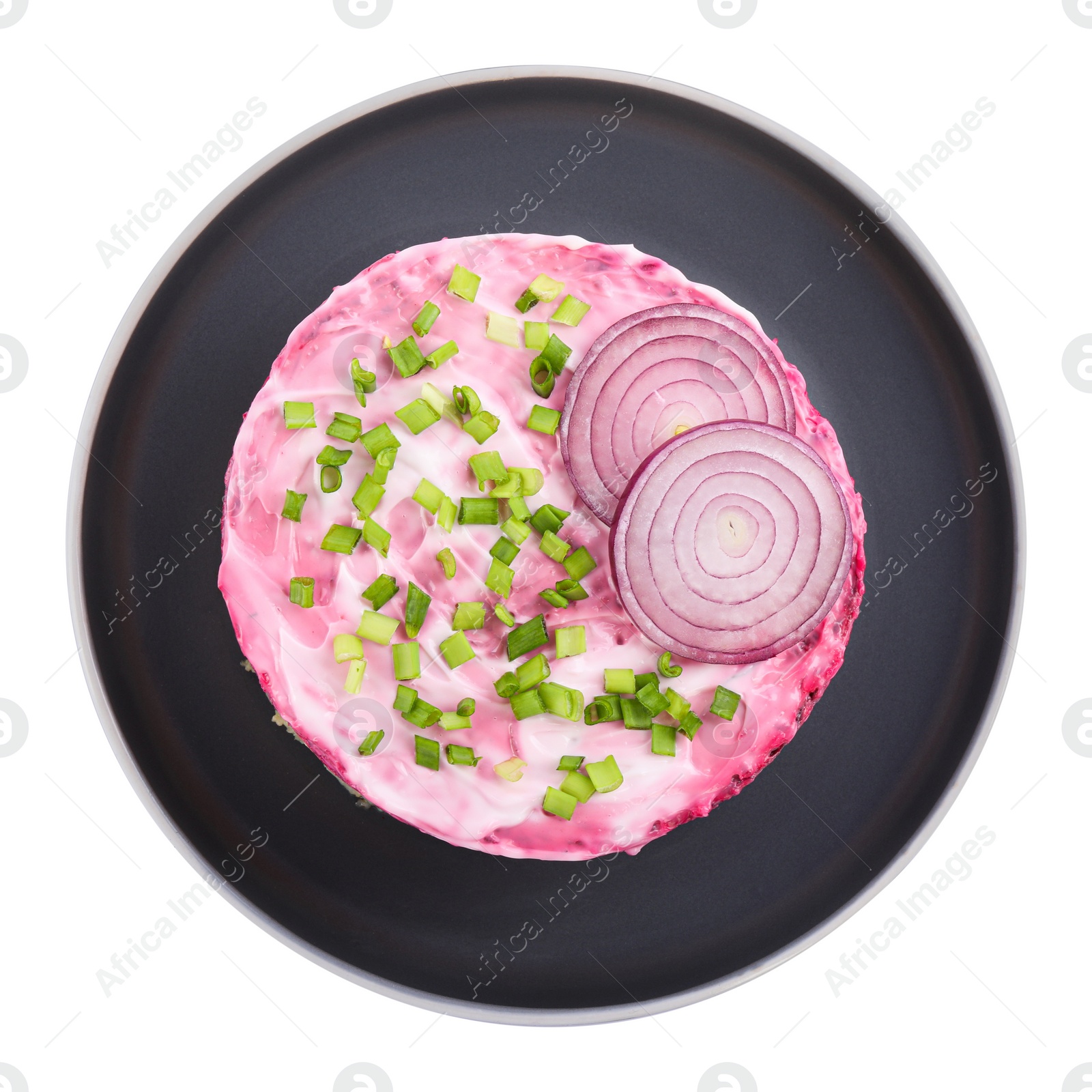 Photo of Herring under fur coat salad isolated on white, top view. Traditional Russian dish