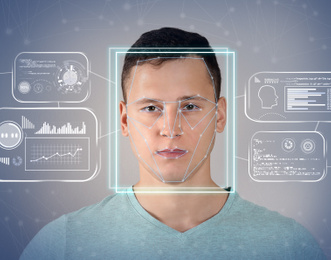 Facial recognition system. Man with scanner frame on face and information