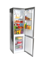 Open refrigerator with many different products on white background