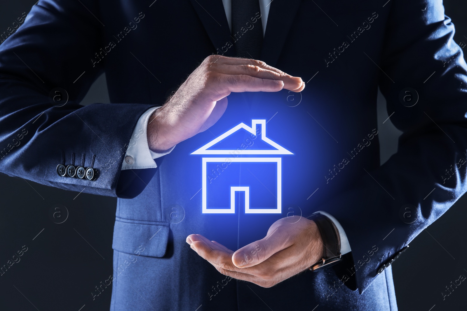 Image of Property insurance concept. Man demonstrating house image, closeup