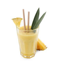 Photo of Tasty pineapple smoothie in glass and slice of fruit isolated on white