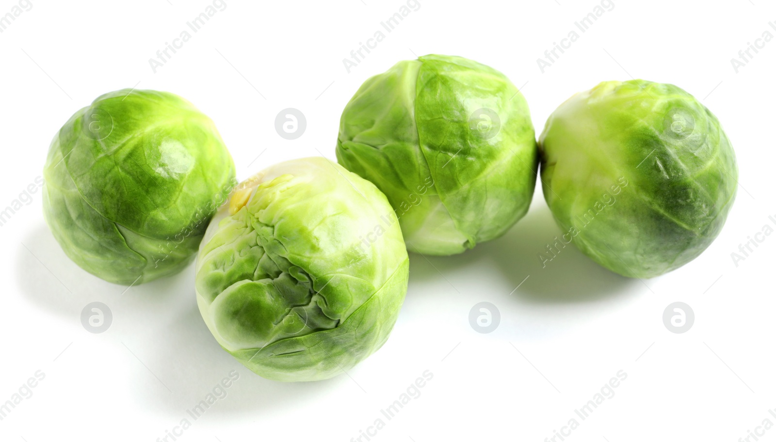 Photo of Fresh tasty Brussels sprouts on white background