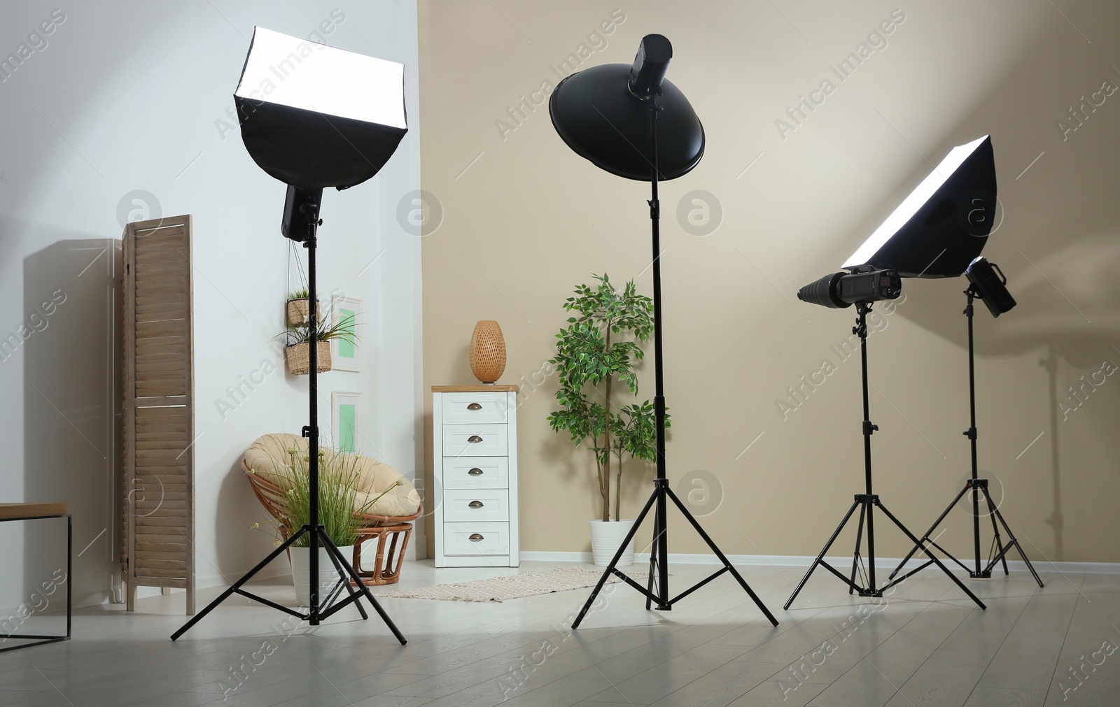 Photo of Example of living room interior design and professional equipment in photo studio