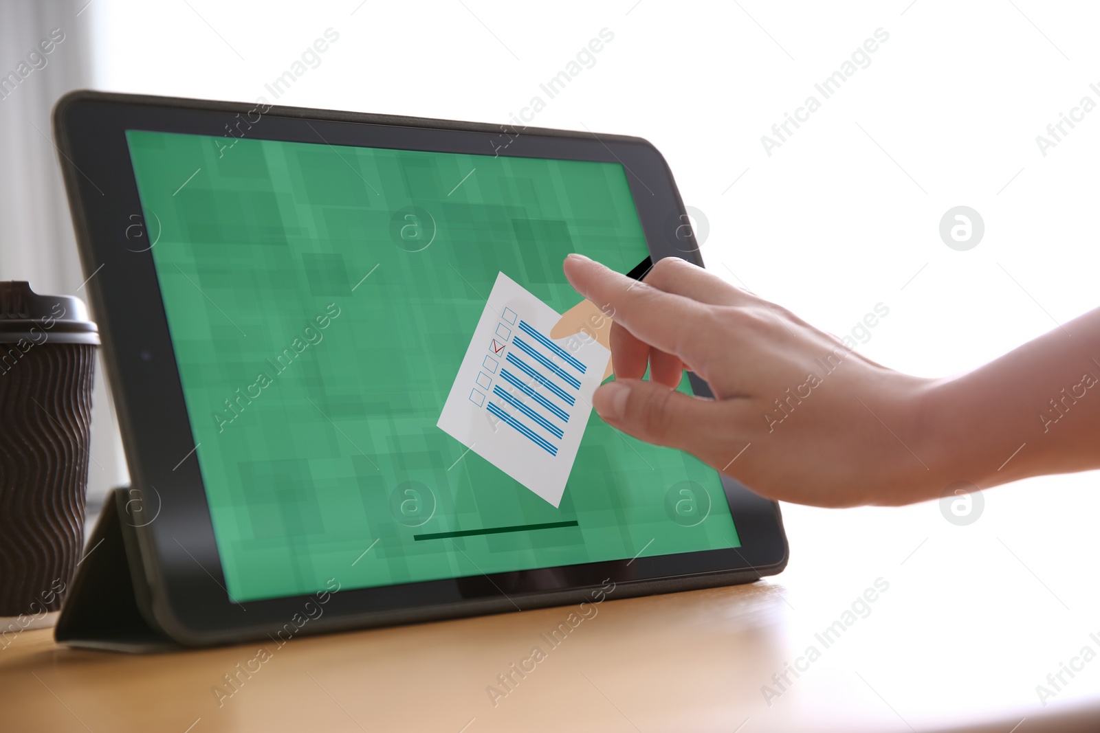 Image of Woman voting online via tablet indoors, closeup