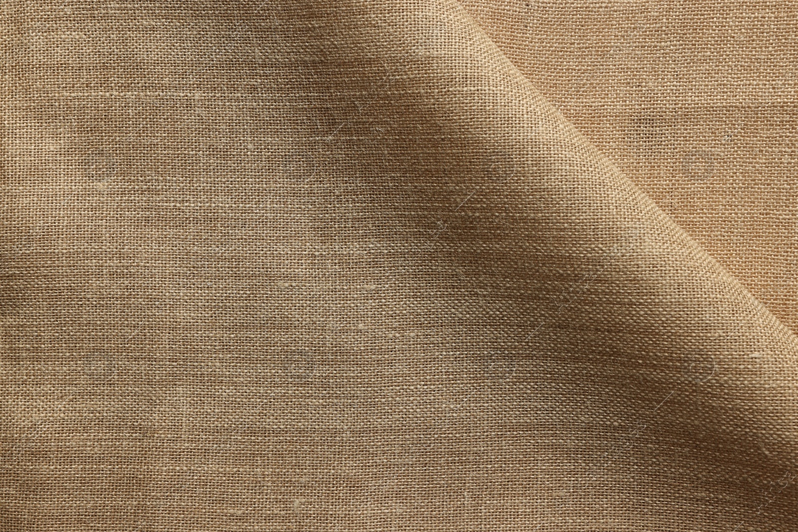 Photo of Texture of burlap fabric as background, top view