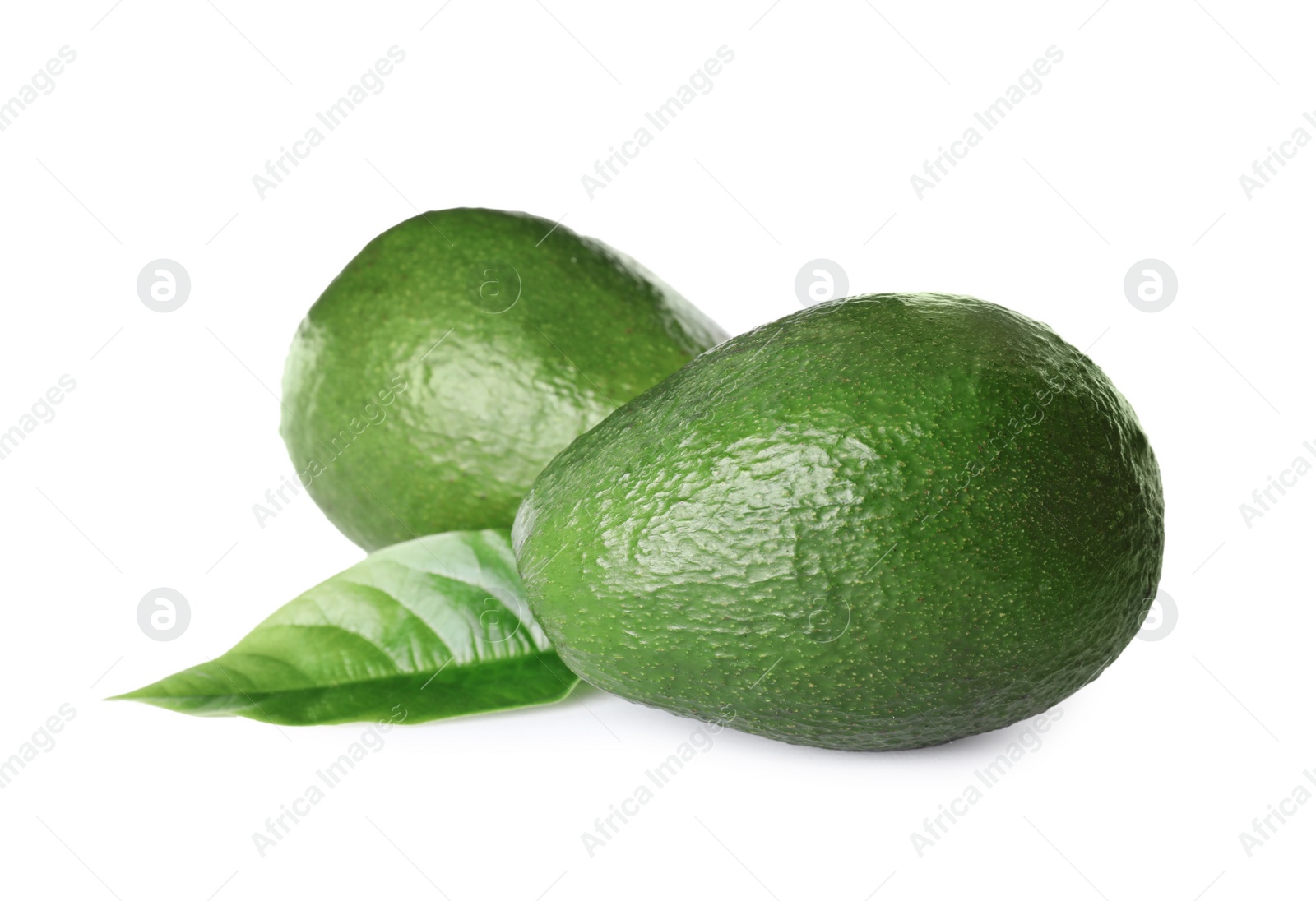 Photo of Tasty fresh ripe avocados isolated on white