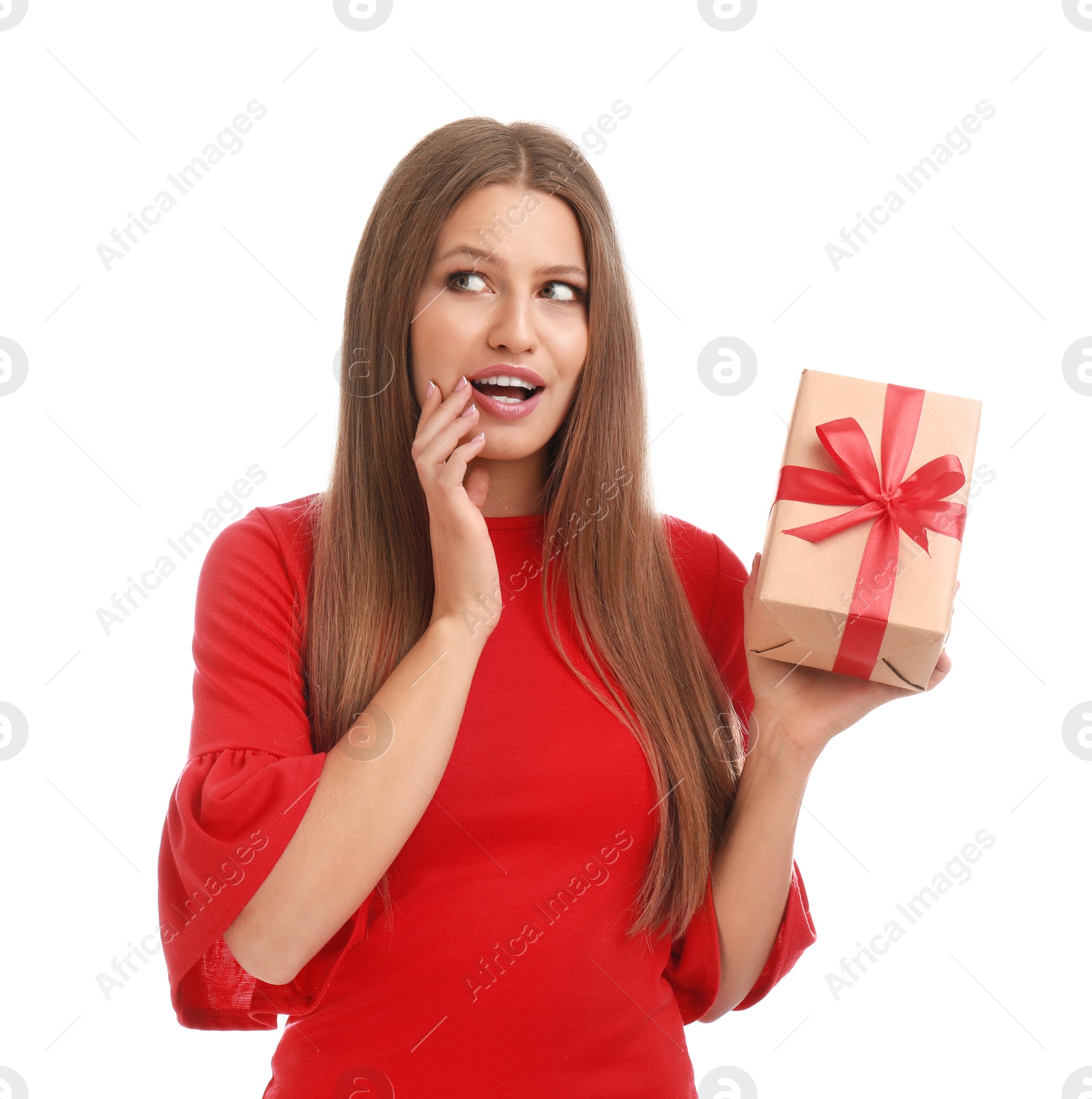 Photo of Emotional young woman with Christmas gift on white background