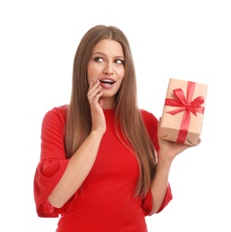 Photo of Emotional young woman with Christmas gift on white background