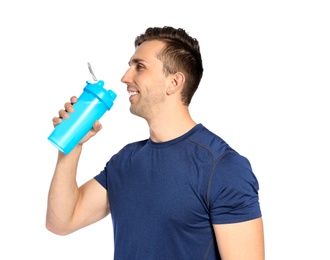 Photo of Portrait of man drinking protein shake on white background