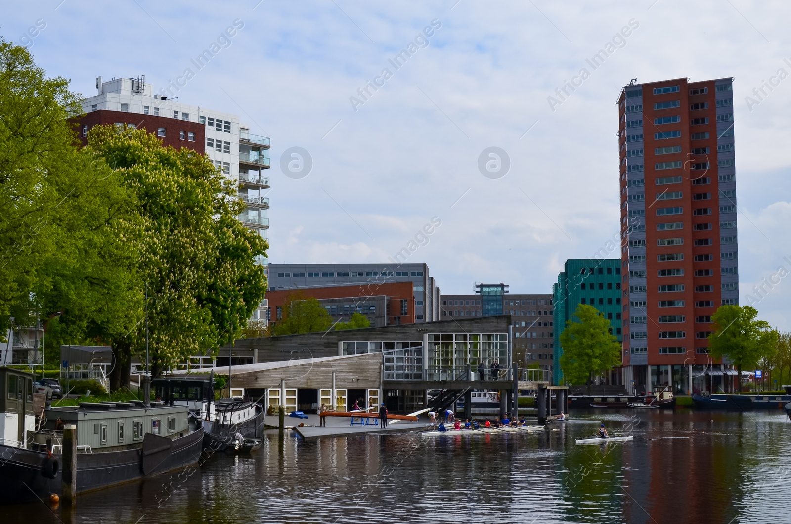 Photo of Beautiful view of houses and city canal with boats