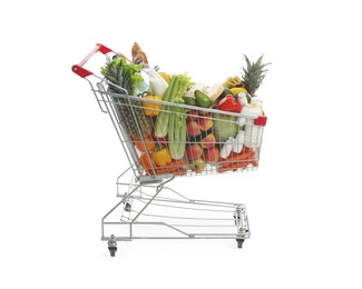 Shopping cart with groceries on white background