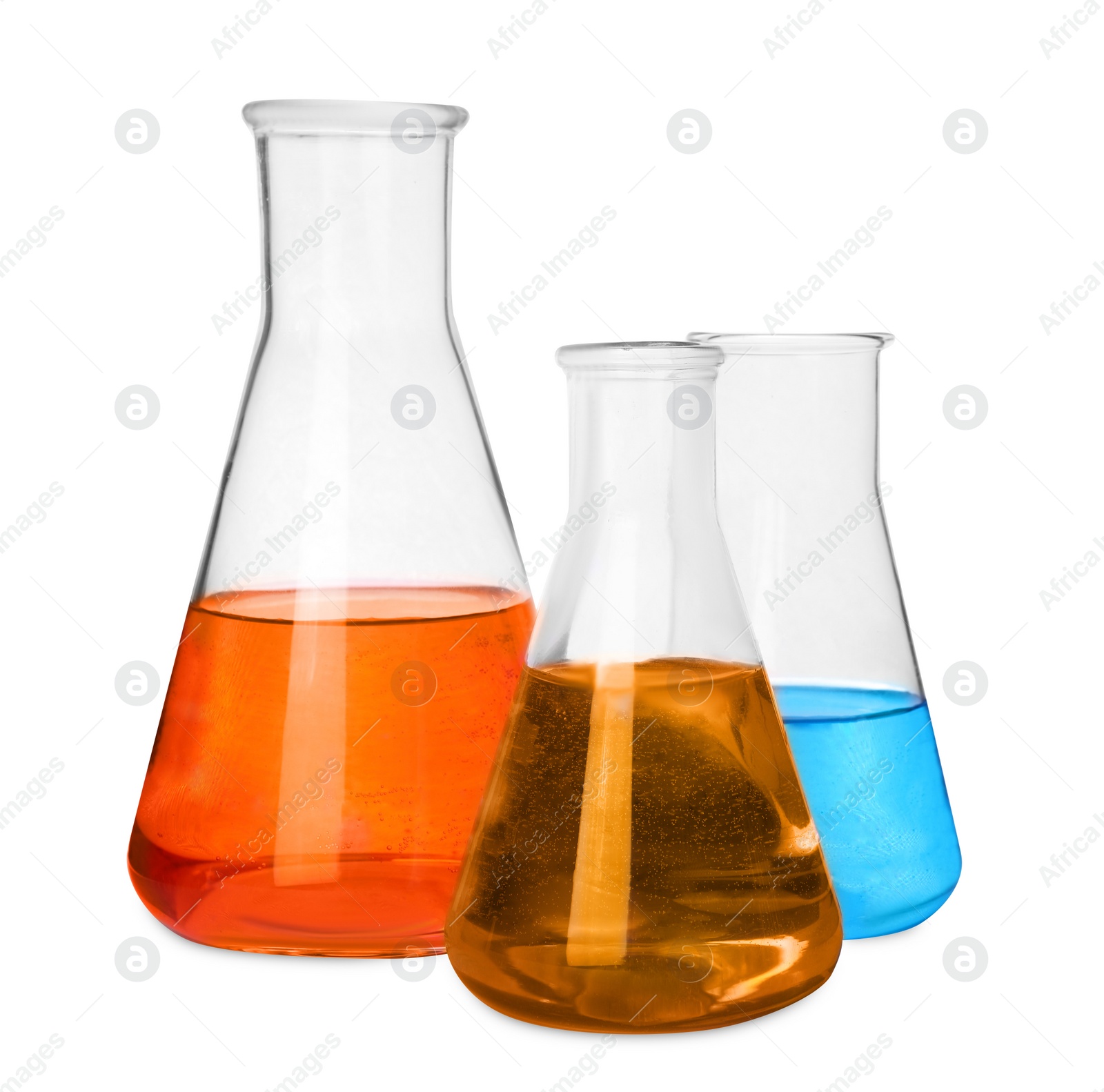 Photo of Laboratory glassware with colorful liquids on white background