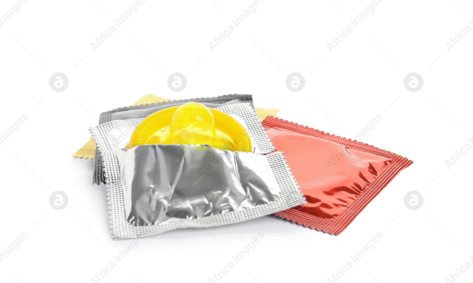 Photo of Condom packages on white background. Safe sex