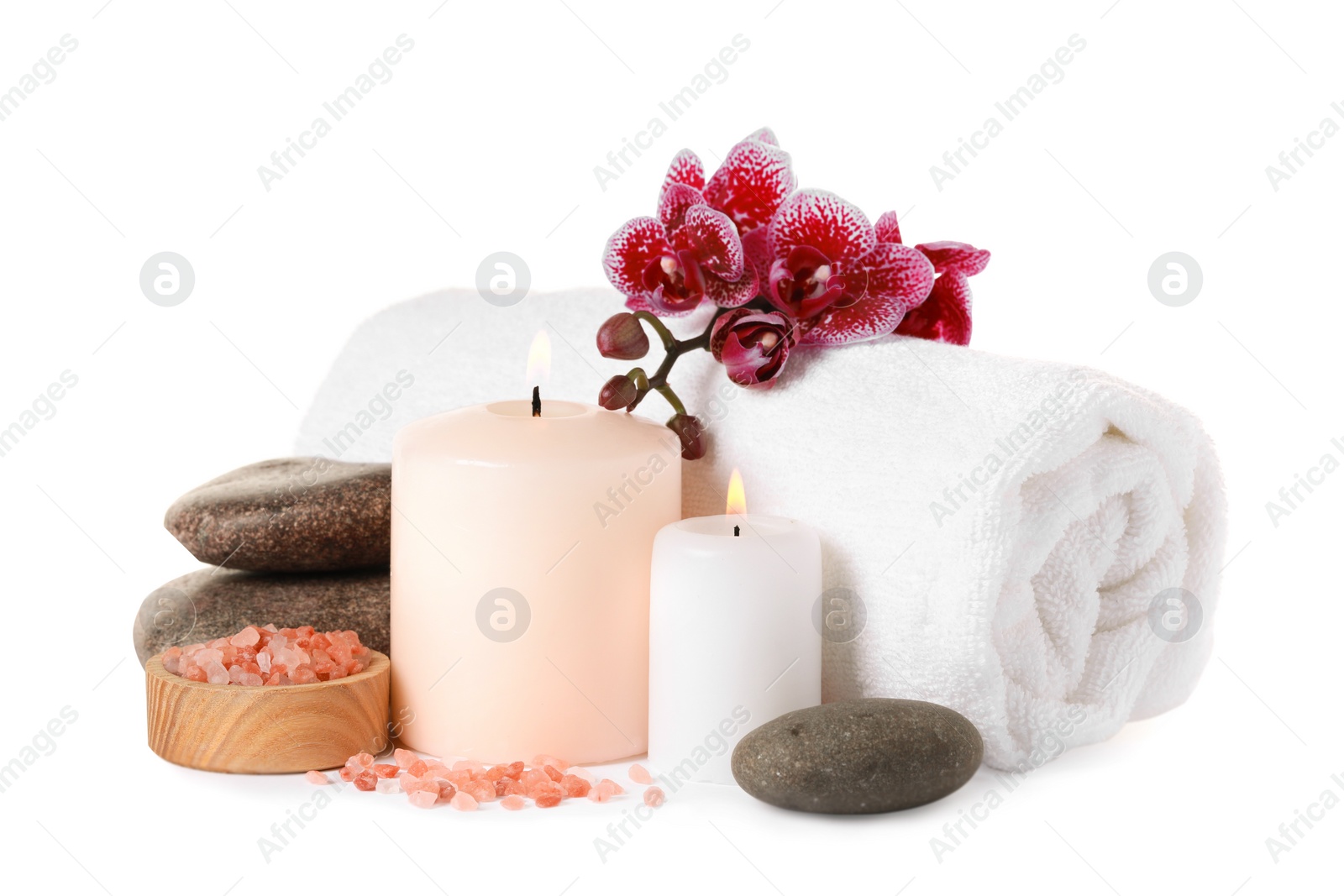 Photo of Beautiful spa composition with burning candles and different care products on white background