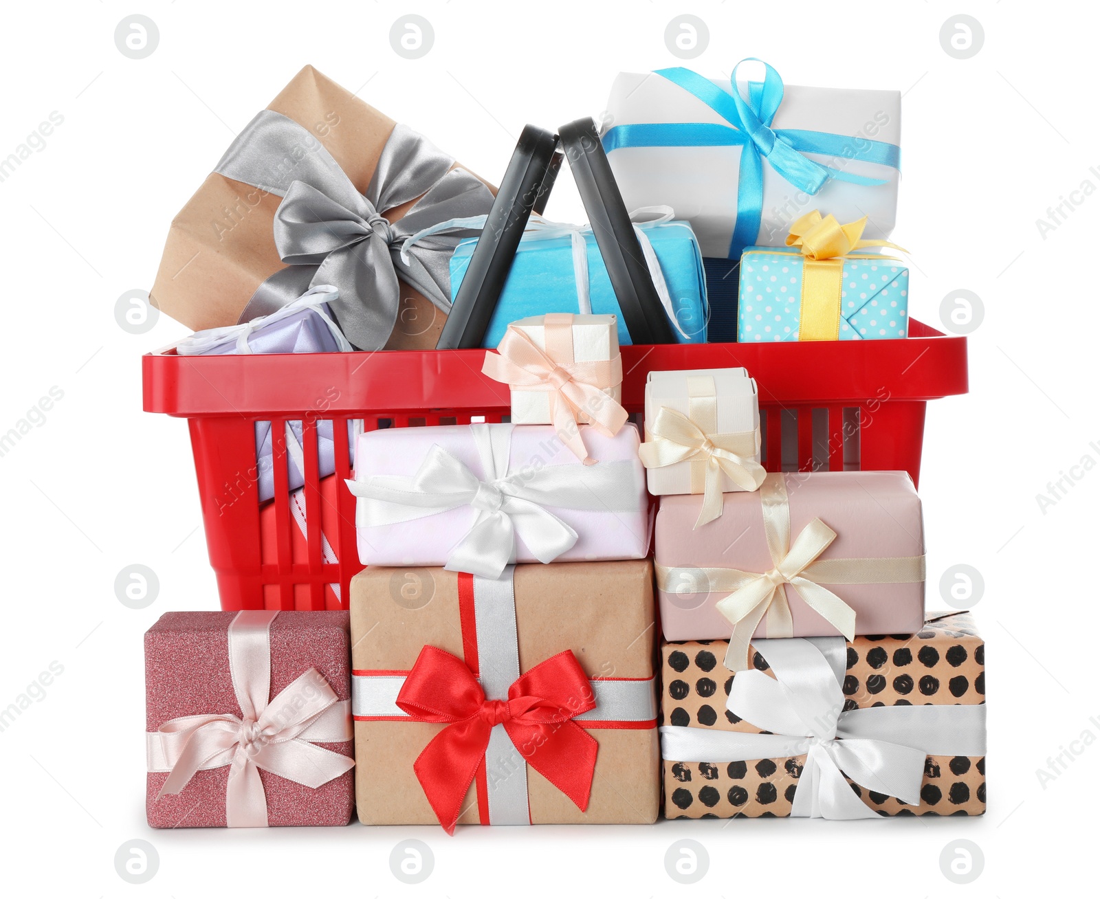 Photo of Red shopping basket with different gifts on white background