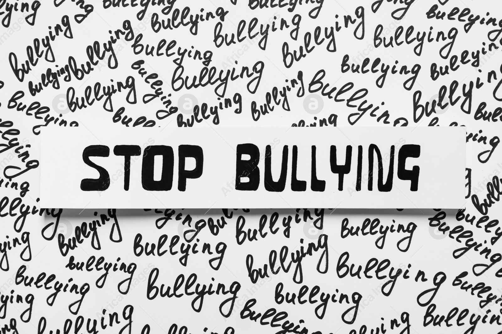 Photo of Composition with text Stop Bullying on white background, top view