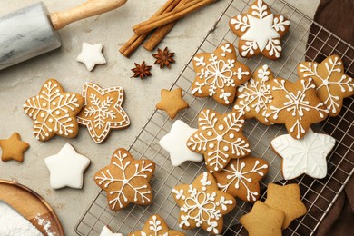 Flat lay composition with tasty Christmas cookies and spices on light table