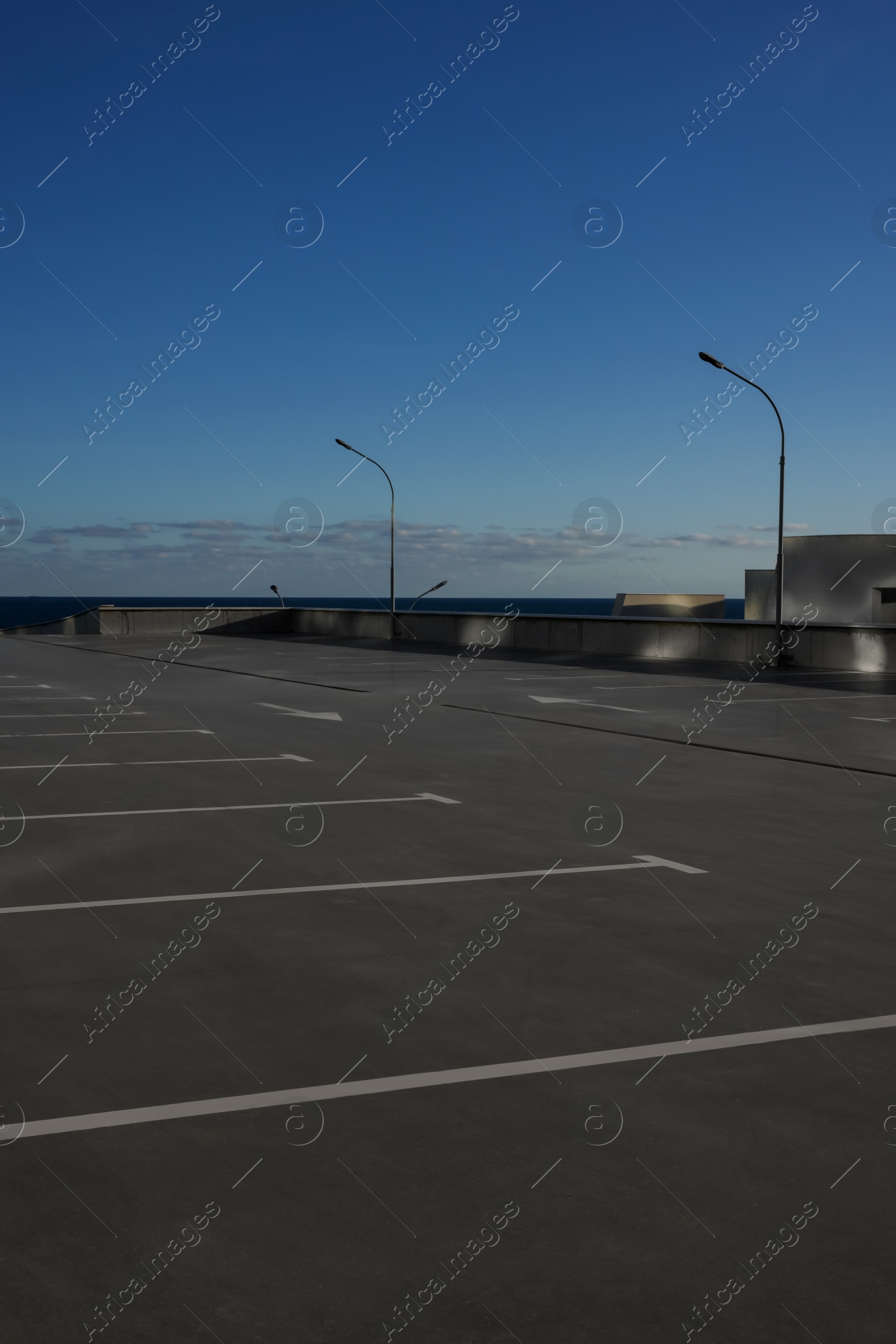 Photo of Outdoor car parking lot on sunny day