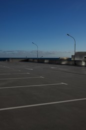 Photo of Outdoor car parking lot on sunny day