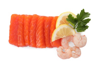 Photo of Delicious sashimi set of salmon and shrimps served with lemon and parsley isolated on white, top view