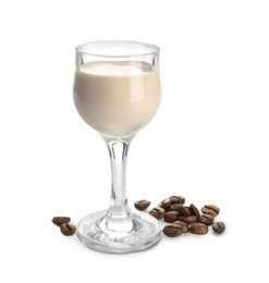 Glass of coffee cream liqueur and beans isolated on white