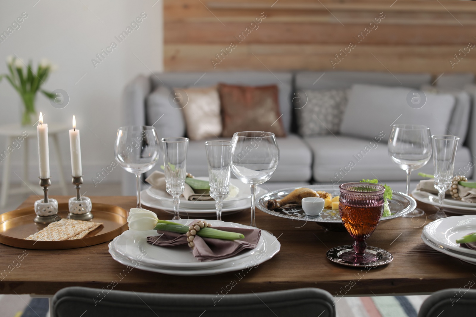 Photo of Festive Passover table setting at home. Pesach celebration