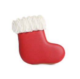 Photo of Tasty gingerbread cookie in shape of boot on white background. St. Nicholas Day celebration