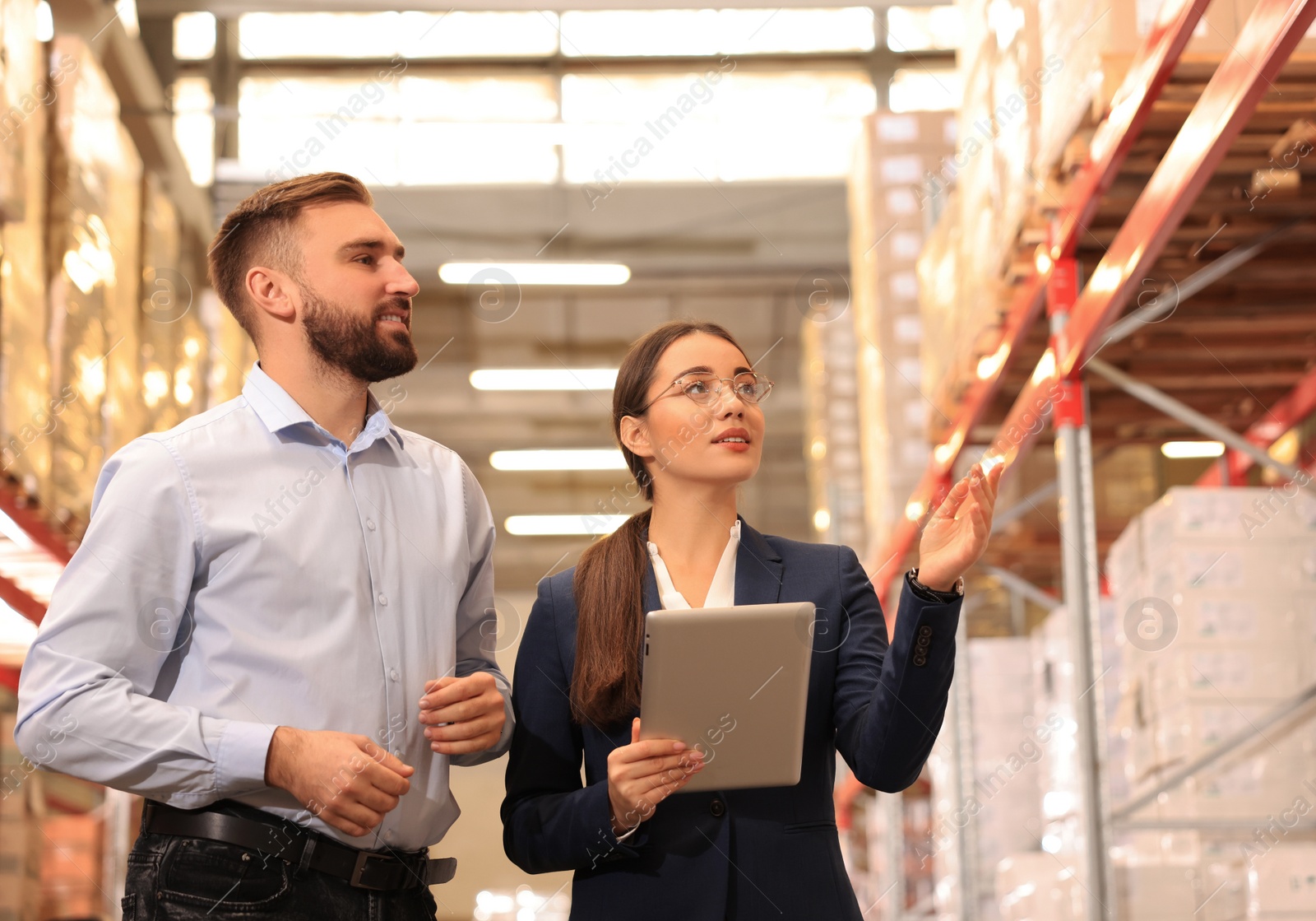 Image of Manager and supervisor at warehouse. Logistics center