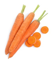Photo of Tasty ripe organic carrots on white background, top view