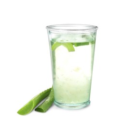 Photo of Fresh aloe drink in glass and leaves on white background