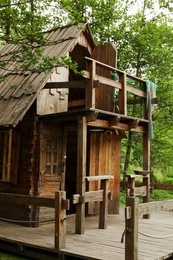 Photo of Old wooden hut in beautiful tranquil forest