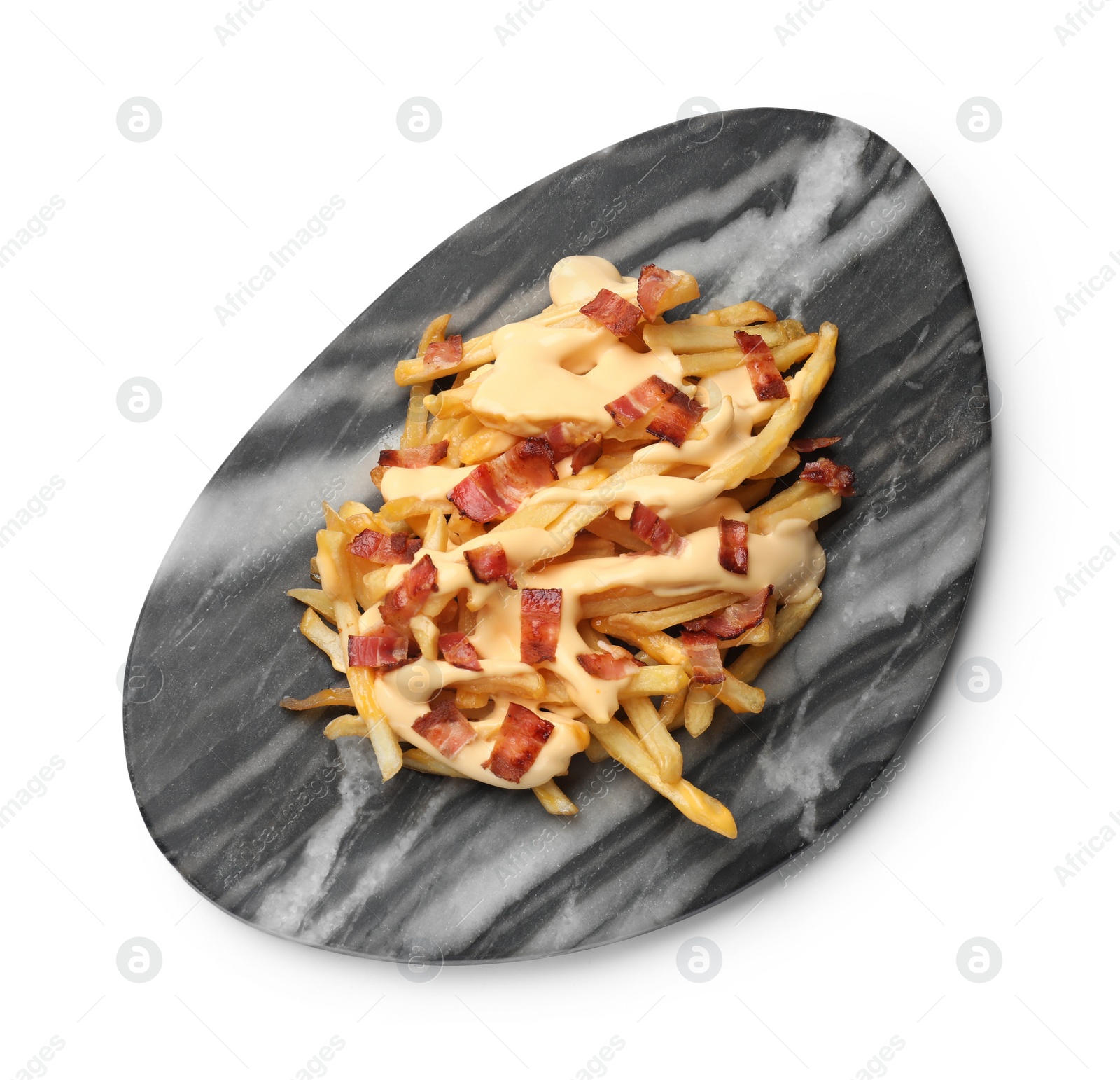 Photo of Delicious French fries with bacon and cheese sauce isolated on white, top view