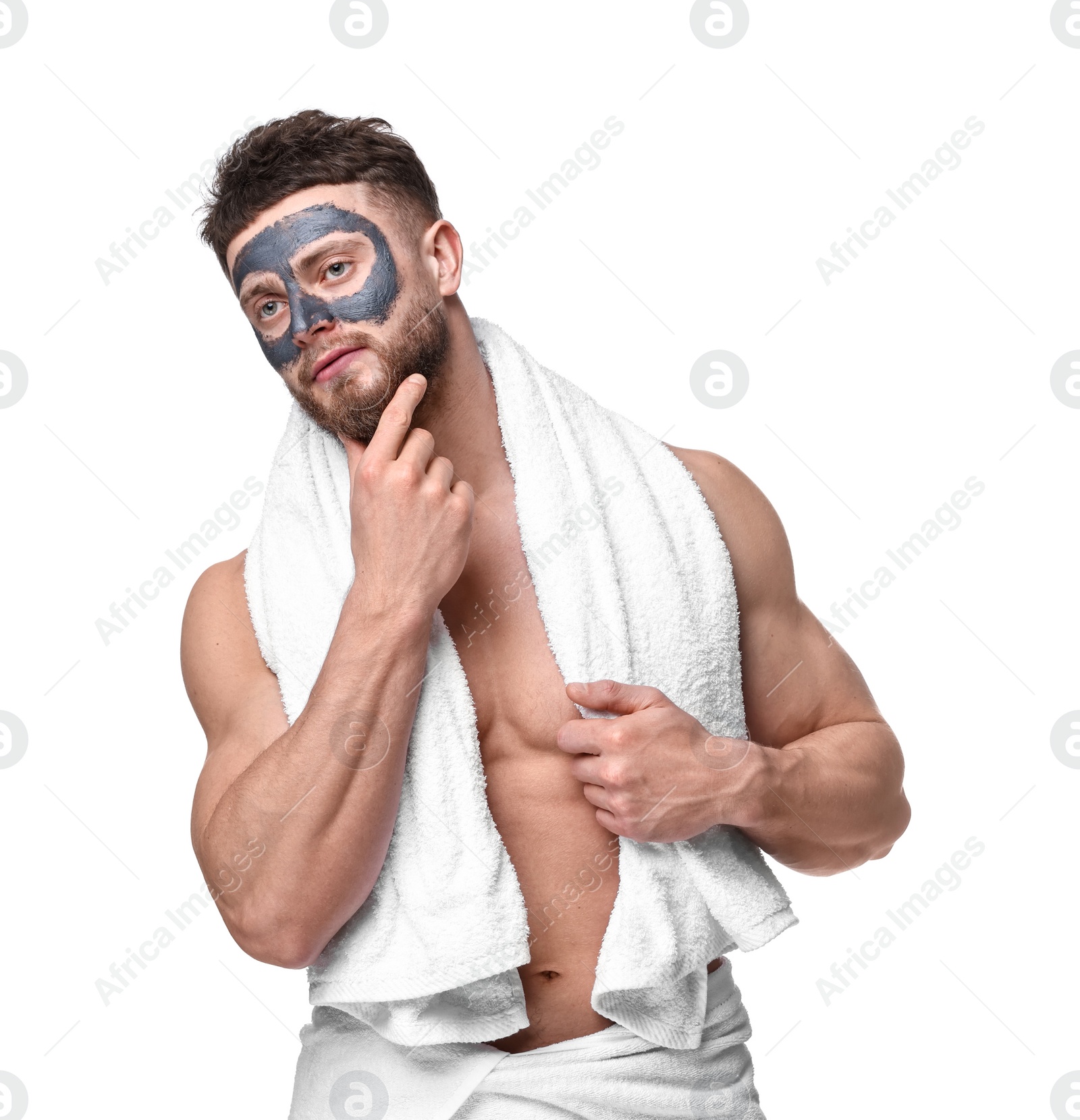 Photo of Handsome man with clay mask on his face against white background