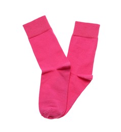 Photo of Pink socks on white background, top view