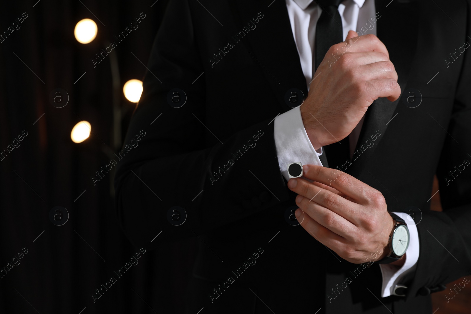 Photo of Man wearing stylish suit and cufflinks, closeup. Space for text