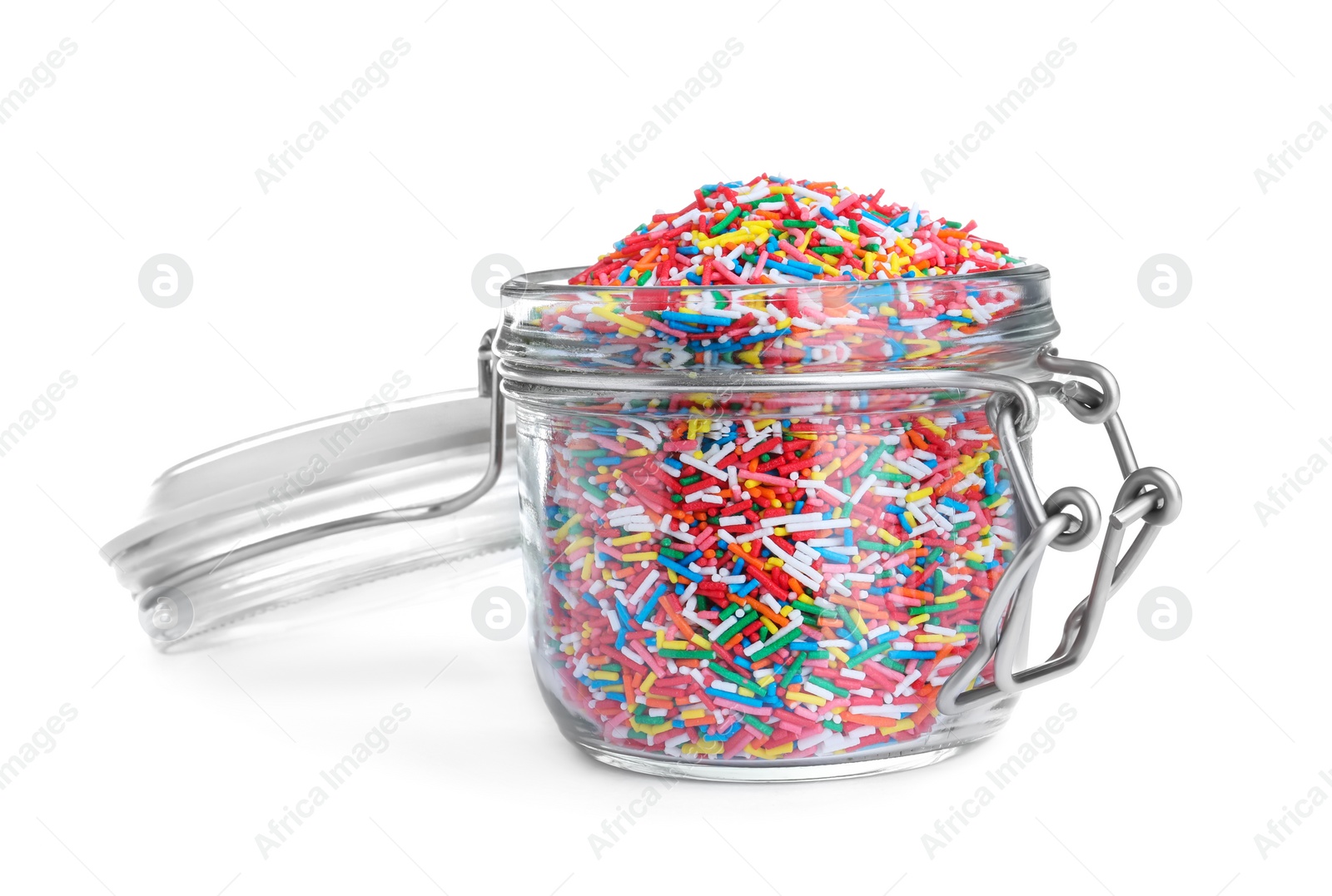 Photo of Colorful sprinkles in glass jar on white background. Confectionery decor