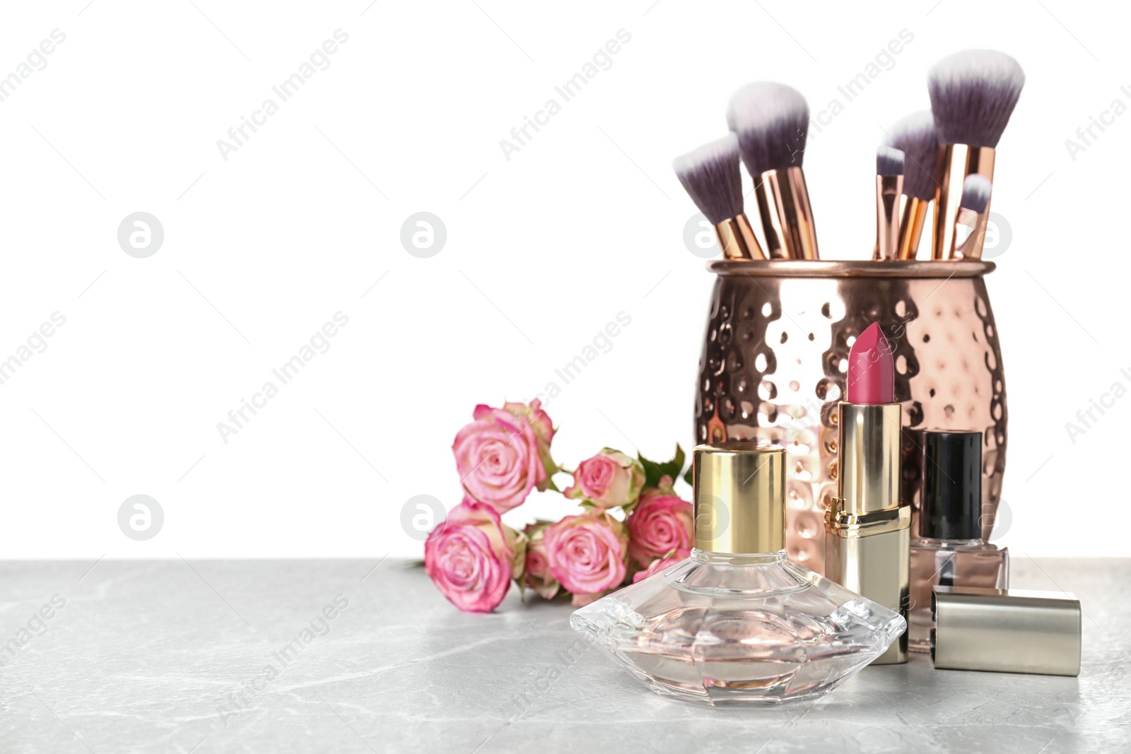 Photo of Beautiful composition with makeup products on table against white background