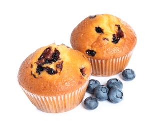 Tasty muffins with blueberries on white background