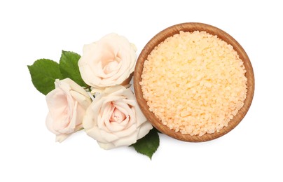 Photo of Orange sea salt in bowl and flowers isolated on white, top view