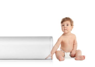 Little baby and test tube on white background