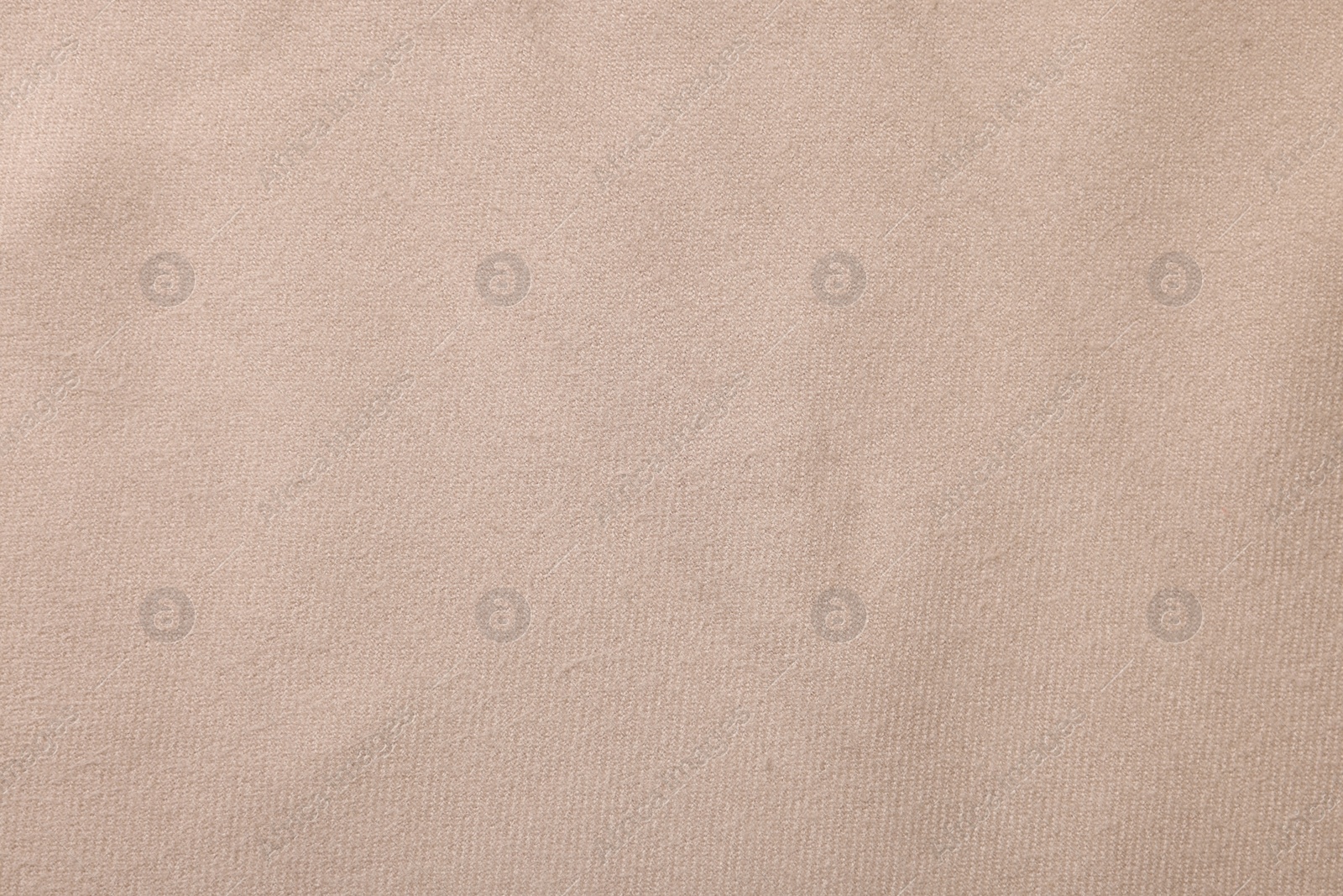 Photo of Texture of beige fabric as background, top view