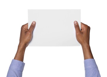 Photo of African American man holding sheet of paper on white background, closeup. Mockup for design