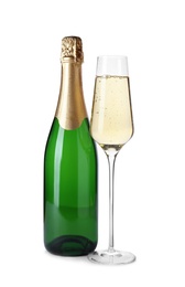 Bottle and glass with champagne on white background. Festive drink