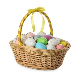Photo of Easter basket with painted eggs on white background