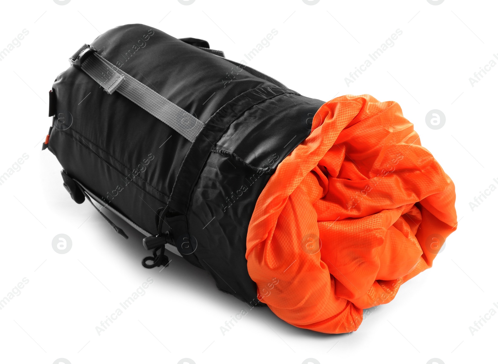 Photo of Rolled sleeping bag on white background. Camping equipment