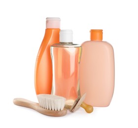 Photo of Bottle of baby oil, other cosmetic products and accessories on white background