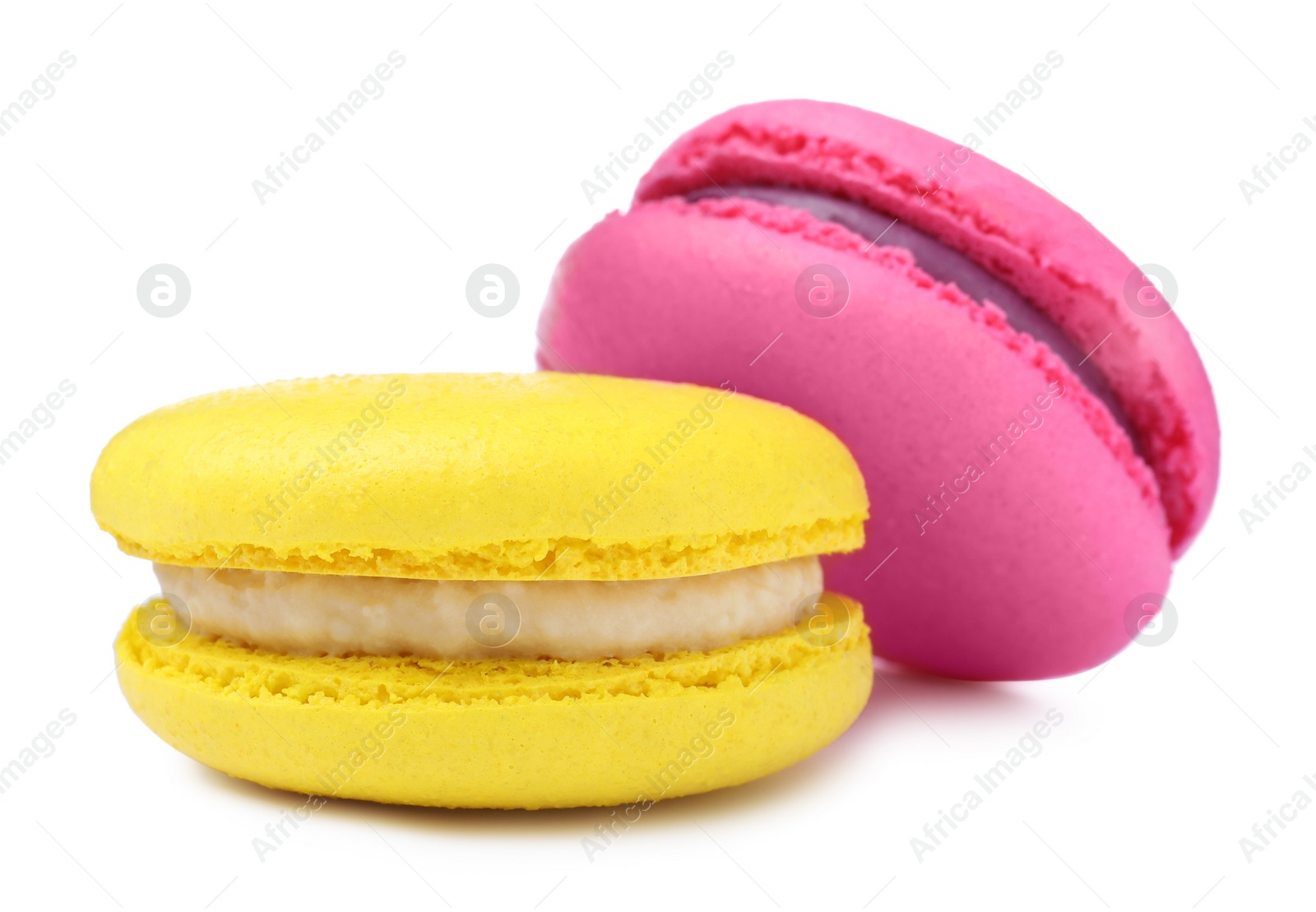 Photo of Different delicious colorful macarons on white background