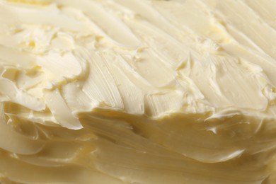 Tasty homemade butter as background, closeup view