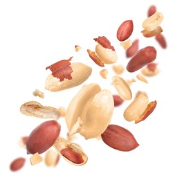 Image of Unpeeled peanuts in air on white background